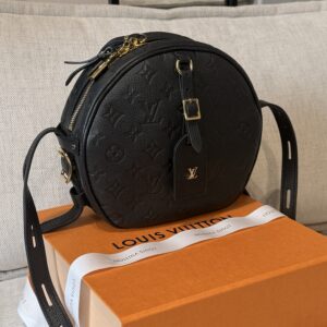 LOUIS VUITTON
Black Monogram Empreinte Leather Boite Chapeau Souple MM Bag